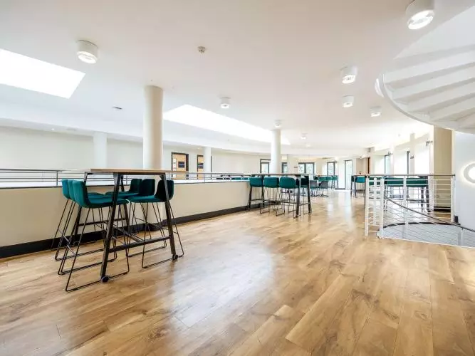 Open plan room with wooden floors