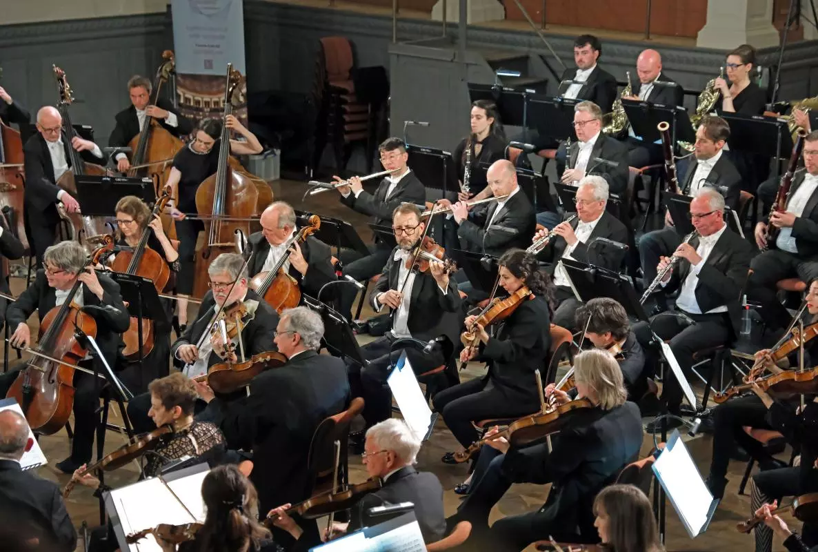 An orchestra performs at the Sheldonian Theatre